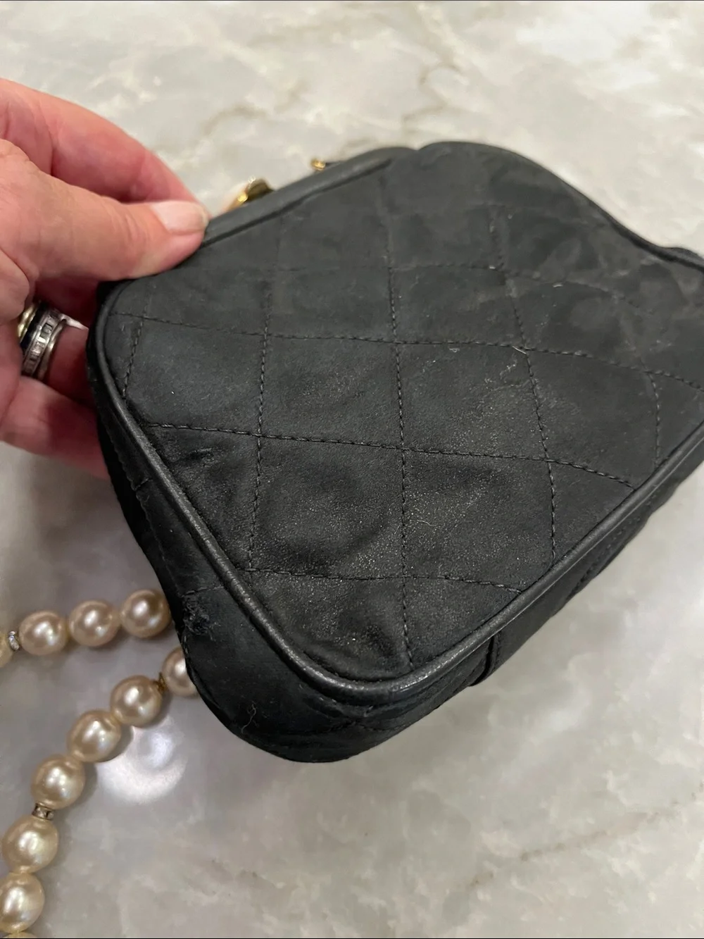 Black Satin Authentic Chanel Evening Bag with faux pearl strap.
